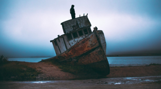 Shipwreck with a man